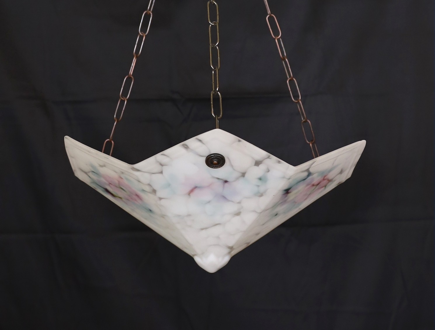 A 1930s hexagonal marbled glass light bowl with internal floral decoration, width 46cm